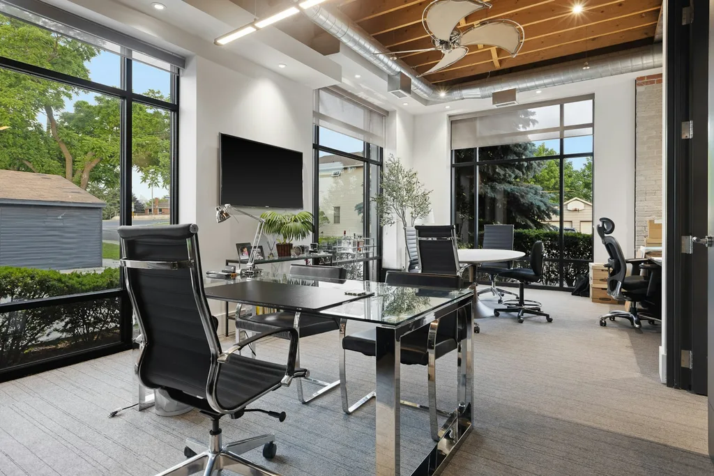 Organised commercial room with table and chairs