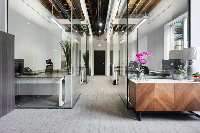 Commercial room with desk and chairs