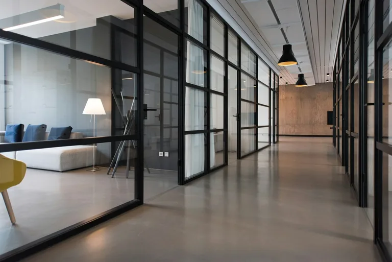 Hallway between glass-panel doors in a commercial building